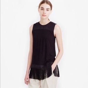 J Crew Sleeveless black knit top with fringe.